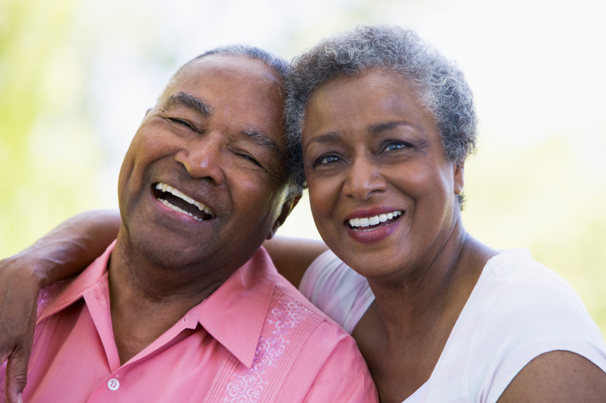 Older Couple Smiling With a San Diego Reverse Mortgage